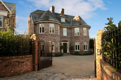 Pair of Complementary Salvaged Brick Dwellings